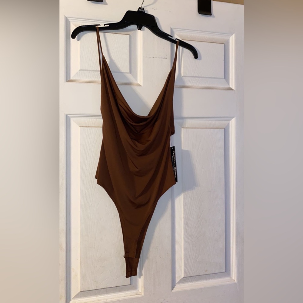 Brown body suit
